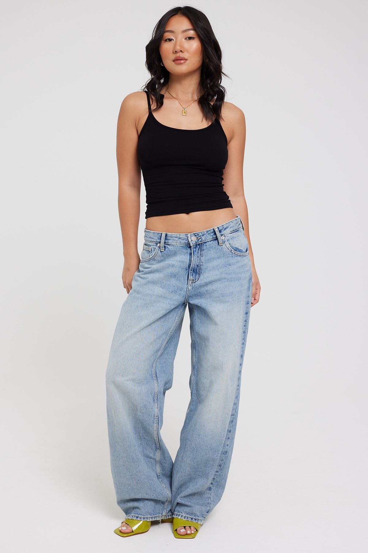 The model is wearing a size 26